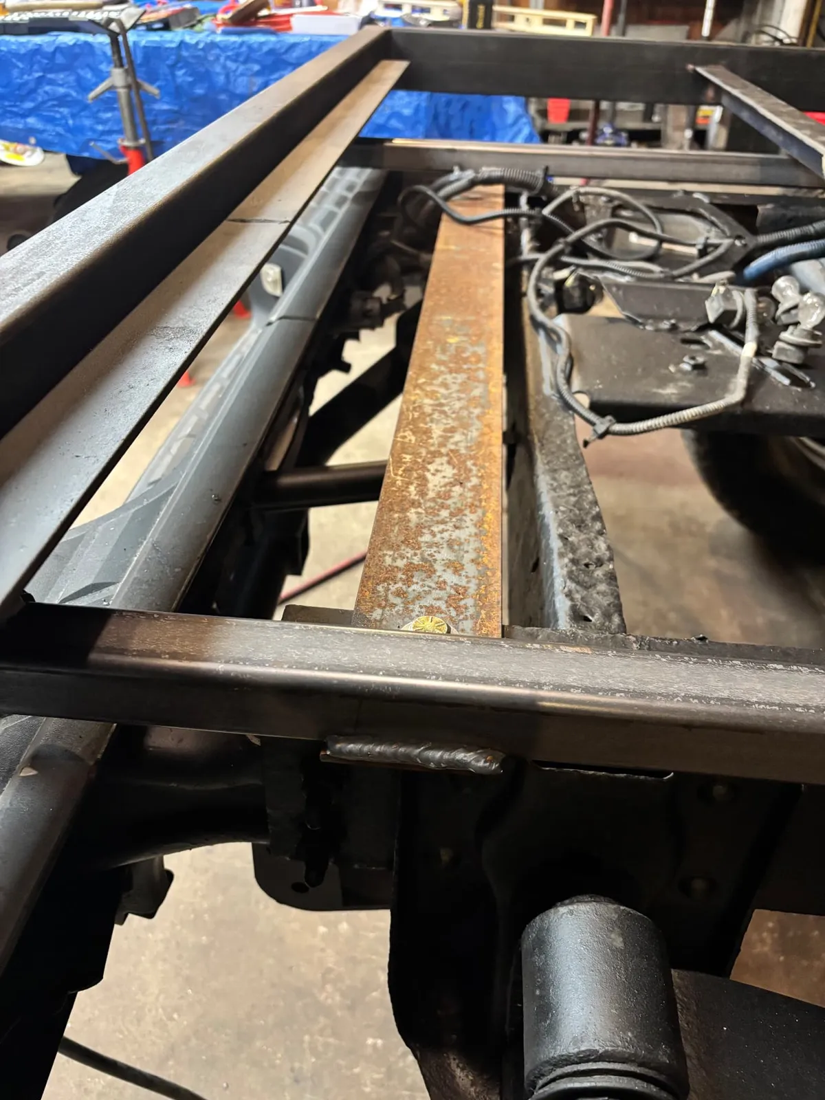 Steel subframe rails set on the truck chassis, CinStar in Petersburg, Kentucky