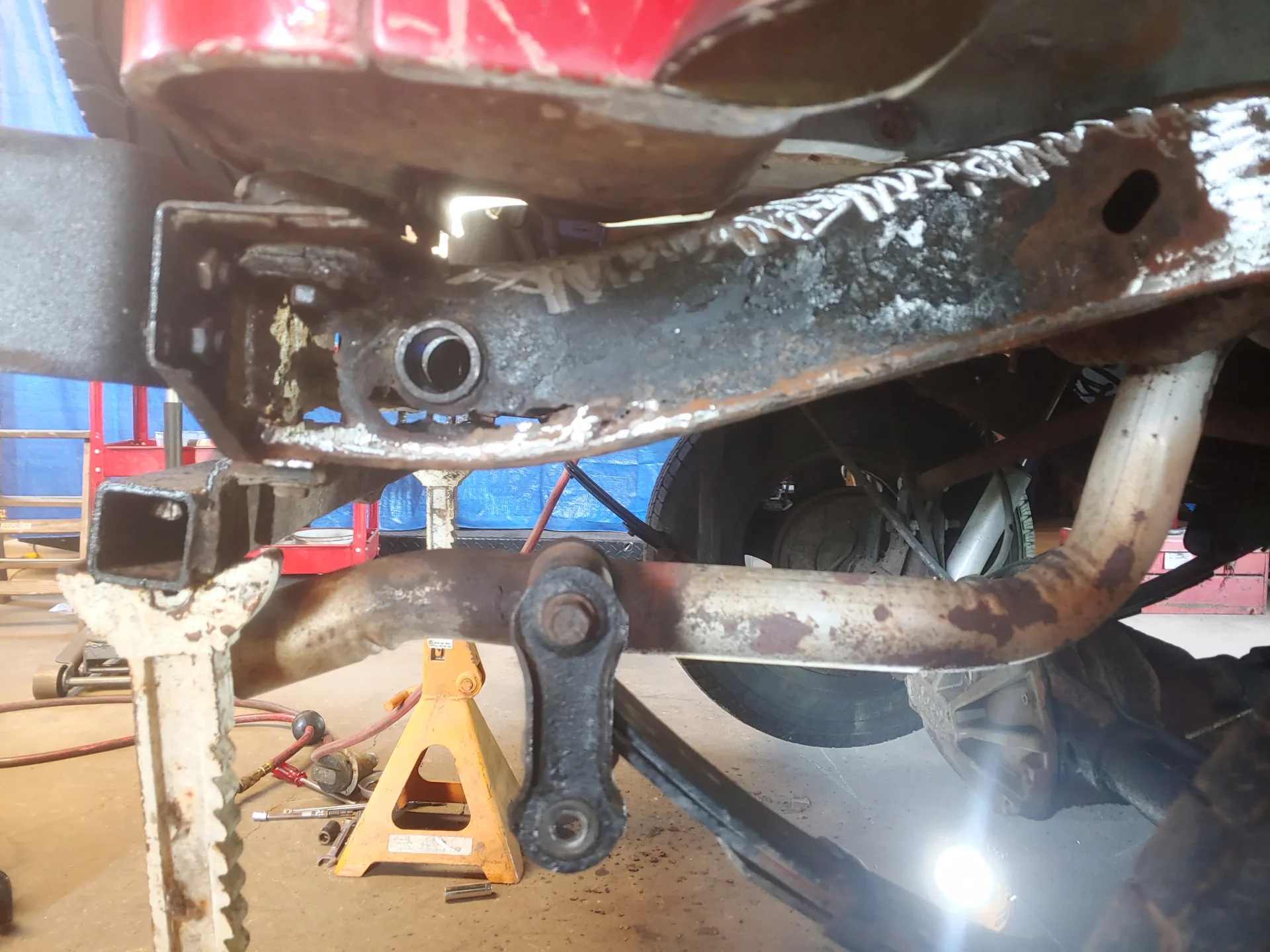 Jeep frame rail — before repair at CinStar in Petersburg, Kentucky