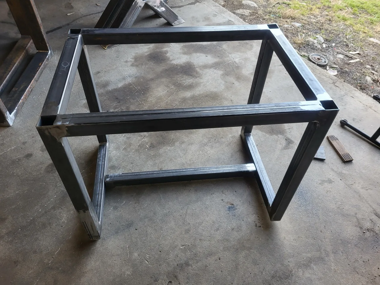 Welded steel table base frame built by CinStar for Ohio Wood Connection