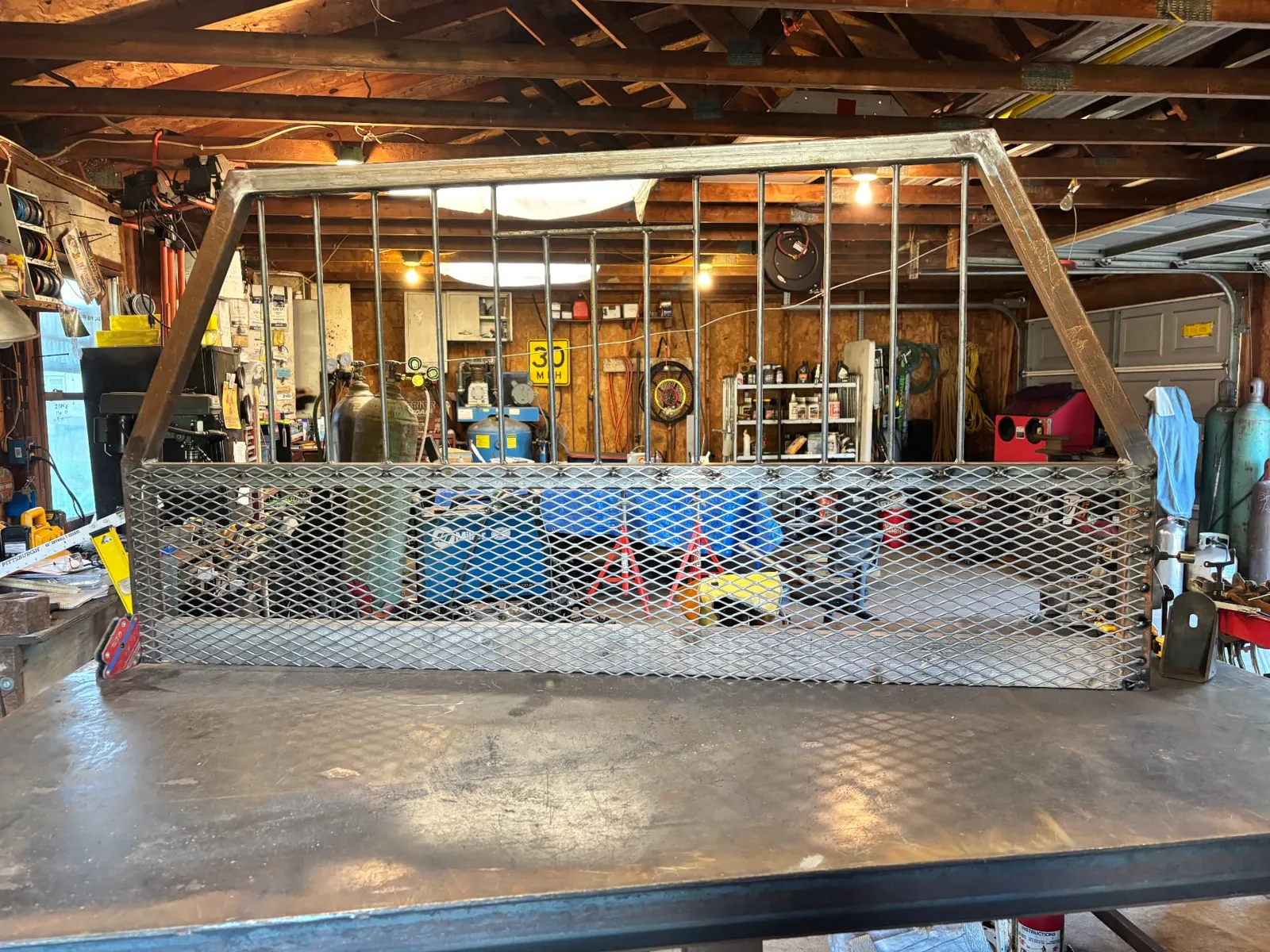 Headache rack with vertical guard bars and expanded metal screen, CinStar in Petersburg, Kentucky