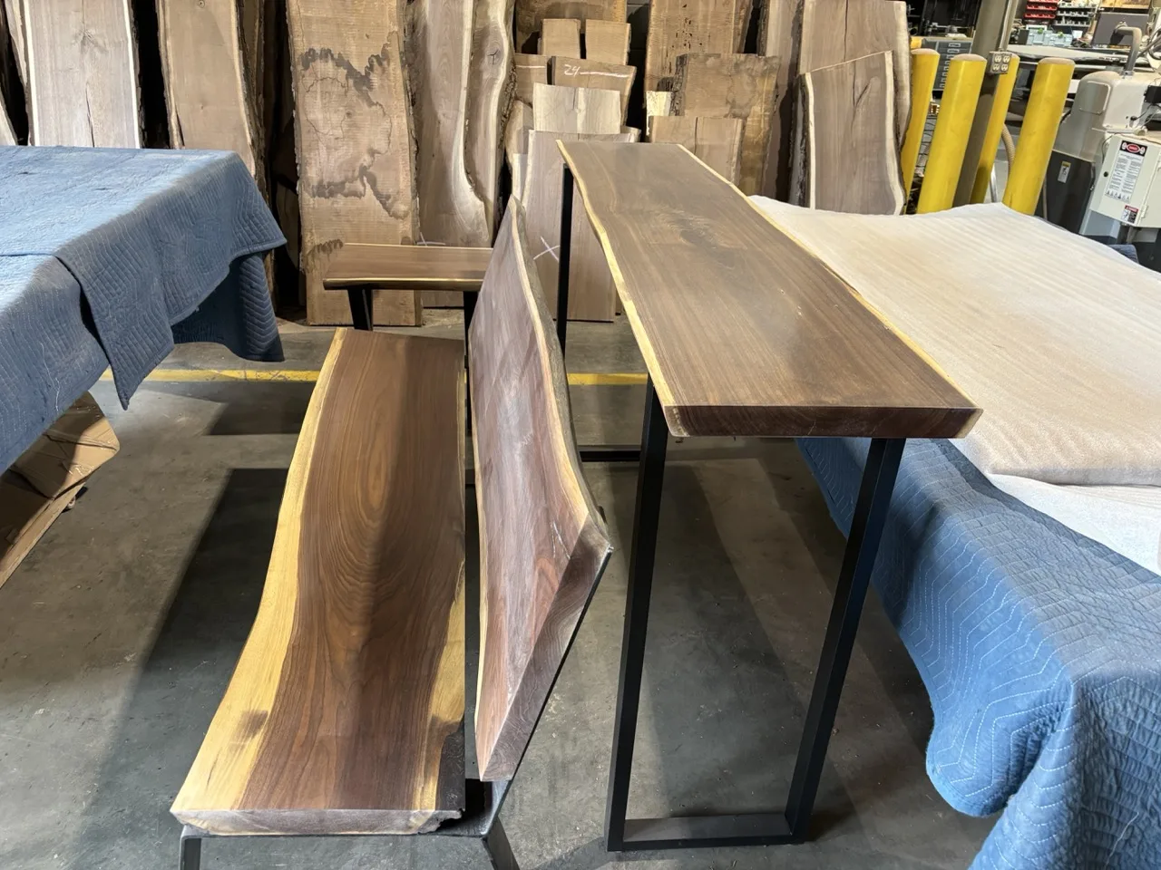 Ohio Wood Connection walnut slabs on CinStar-built steel table bases