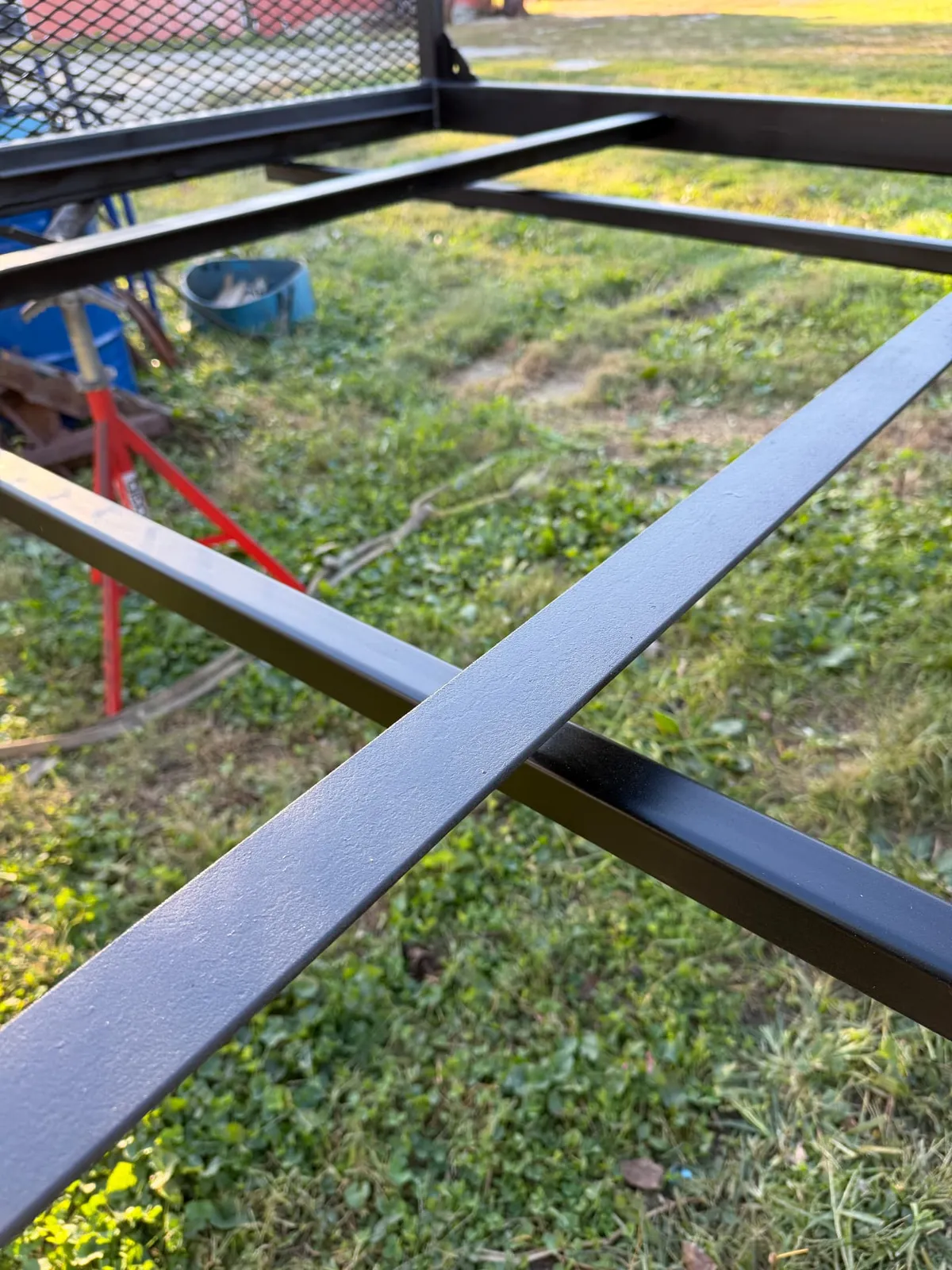 Black protective finish on the crossmembers, close-up, CinStar in Petersburg, Kentucky