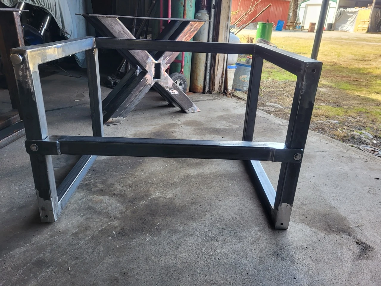 Fabricated steel table base waiting on finish at the CinStar shop for Ohio Wood Connection