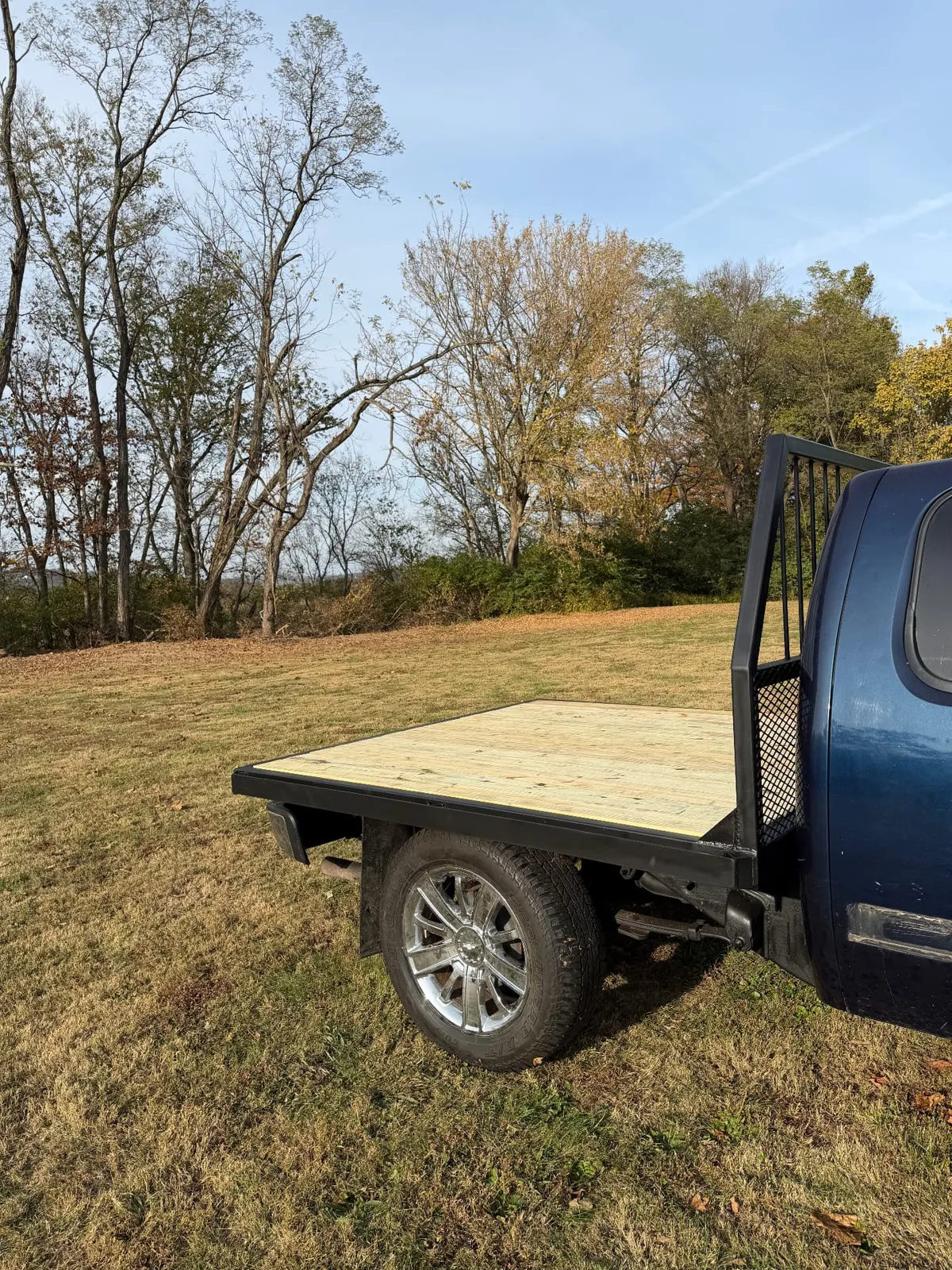 Finished flatbed and headache rack installed on a pickup, side view, CinStar in Petersburg, Kentucky