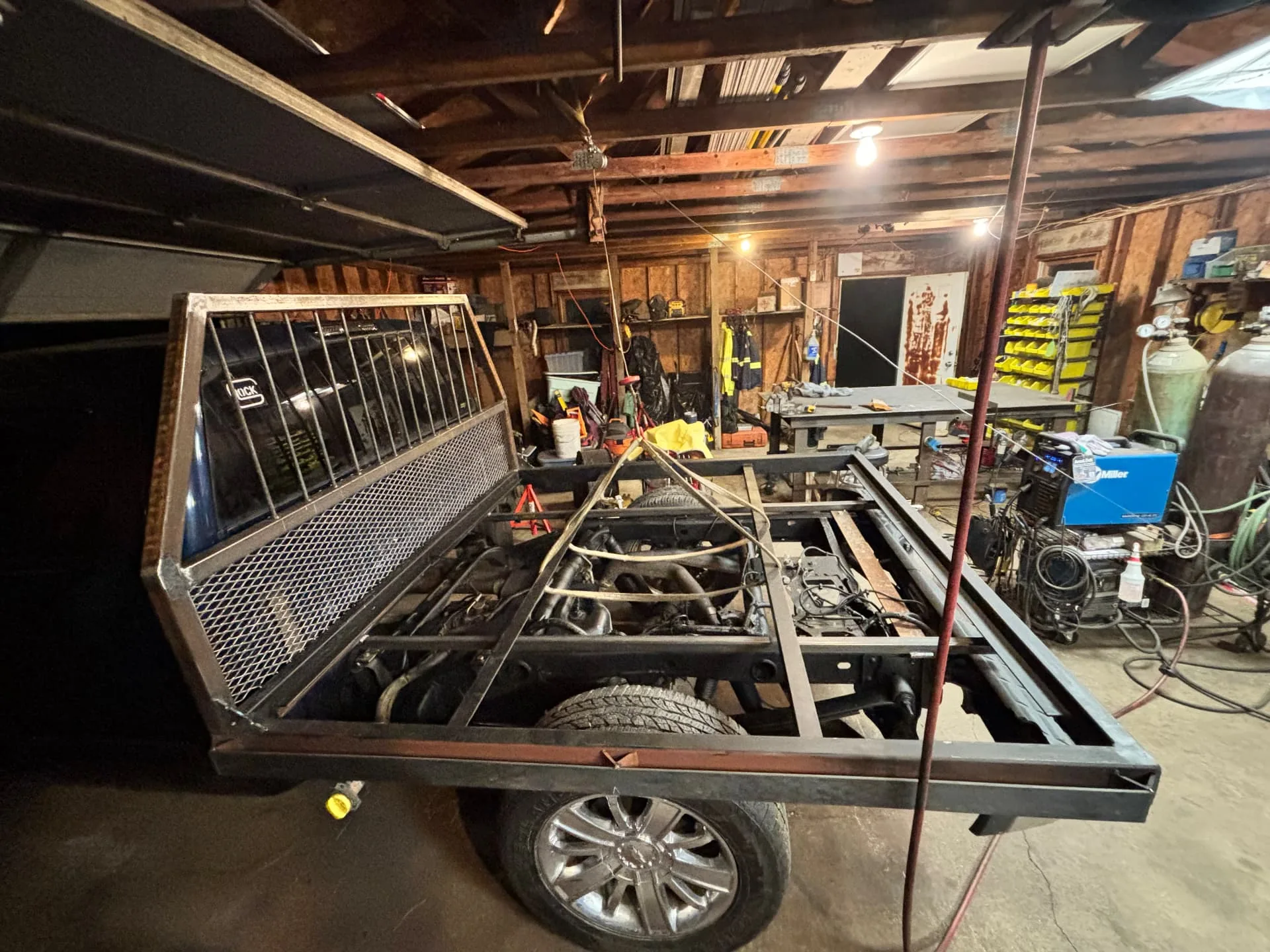 Flatbed frame and headache rack fitted to the truck in the shop, CinStar in Petersburg, Kentucky