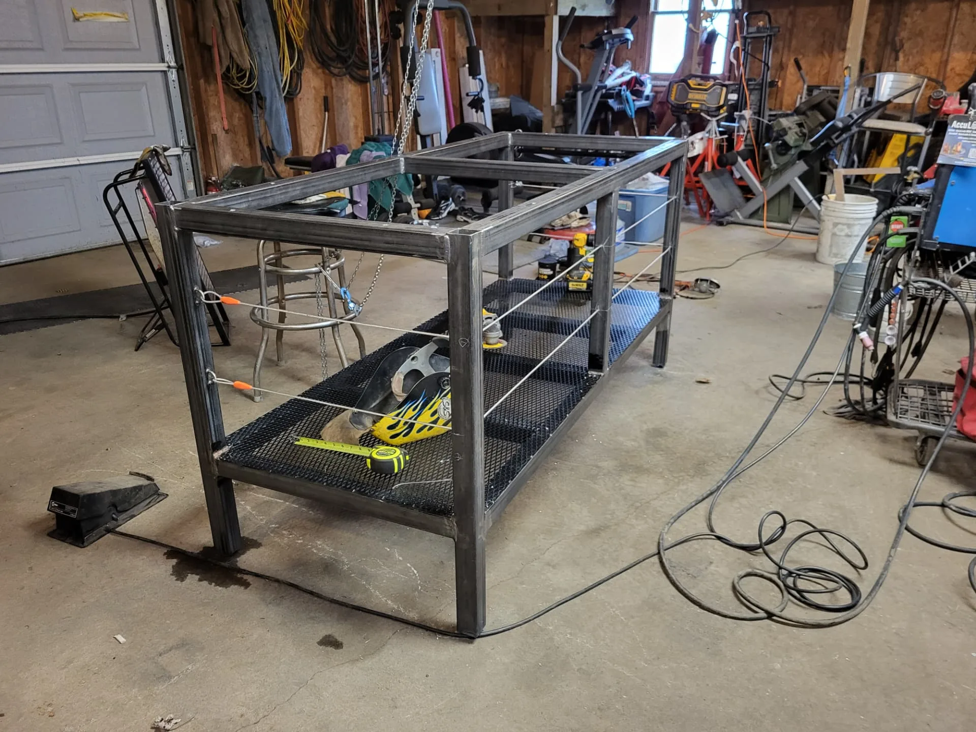 Kitchen island base frame with expanded metal storage shelves, welded by CinStar