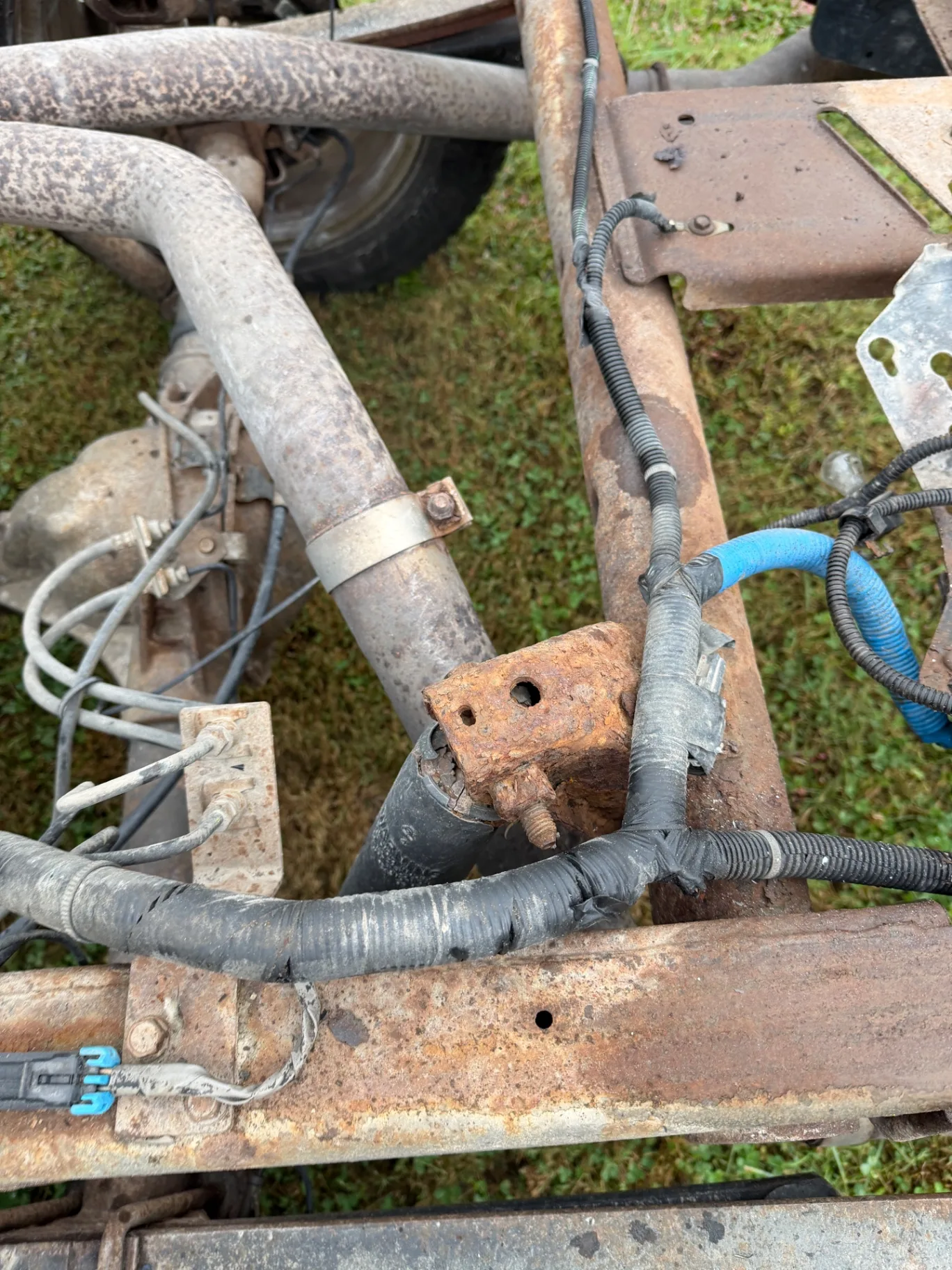 Rear crossmember rust detail before treatment, CinStar in Petersburg, Kentucky